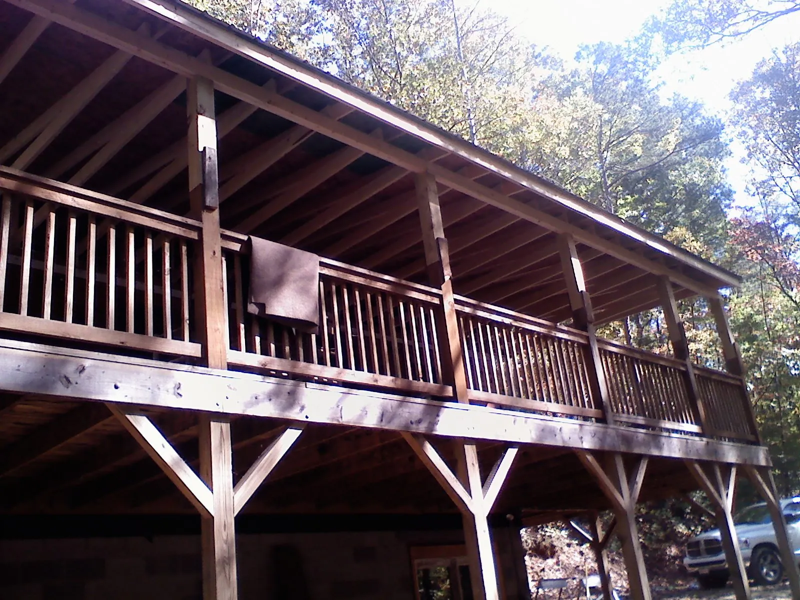 Timber framing under a new elevated porch and deck — Roof Leak Repair in Signal Hill by Roofing Brothers